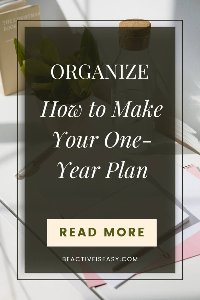 how to make your one year plan cover image with a background of journals and a bottle of water